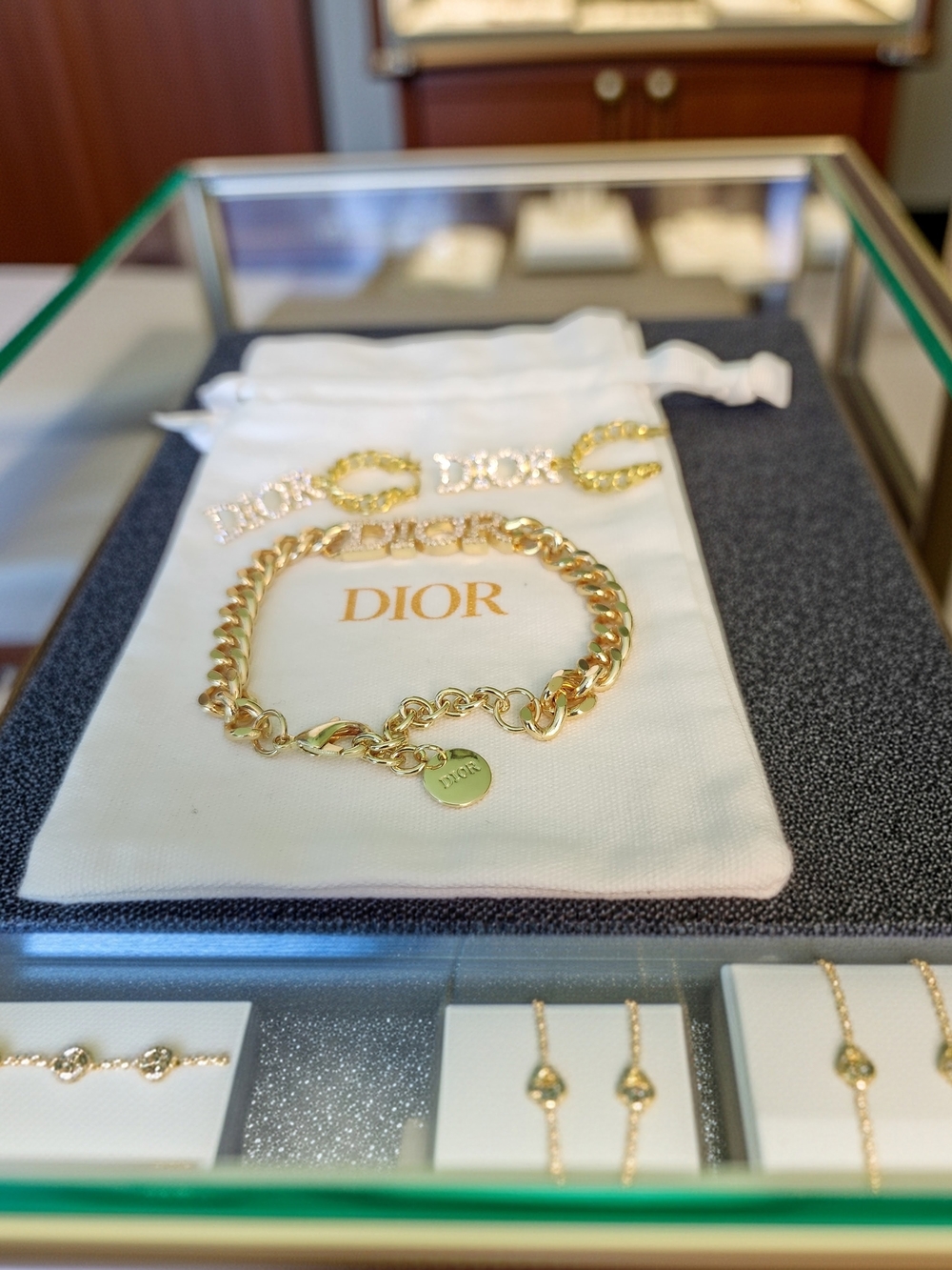 Dior Gold-Tone Curb Chain Bracelet with Earrings